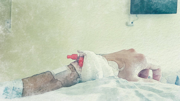 Hospital patient resting in bed during a hospital stay